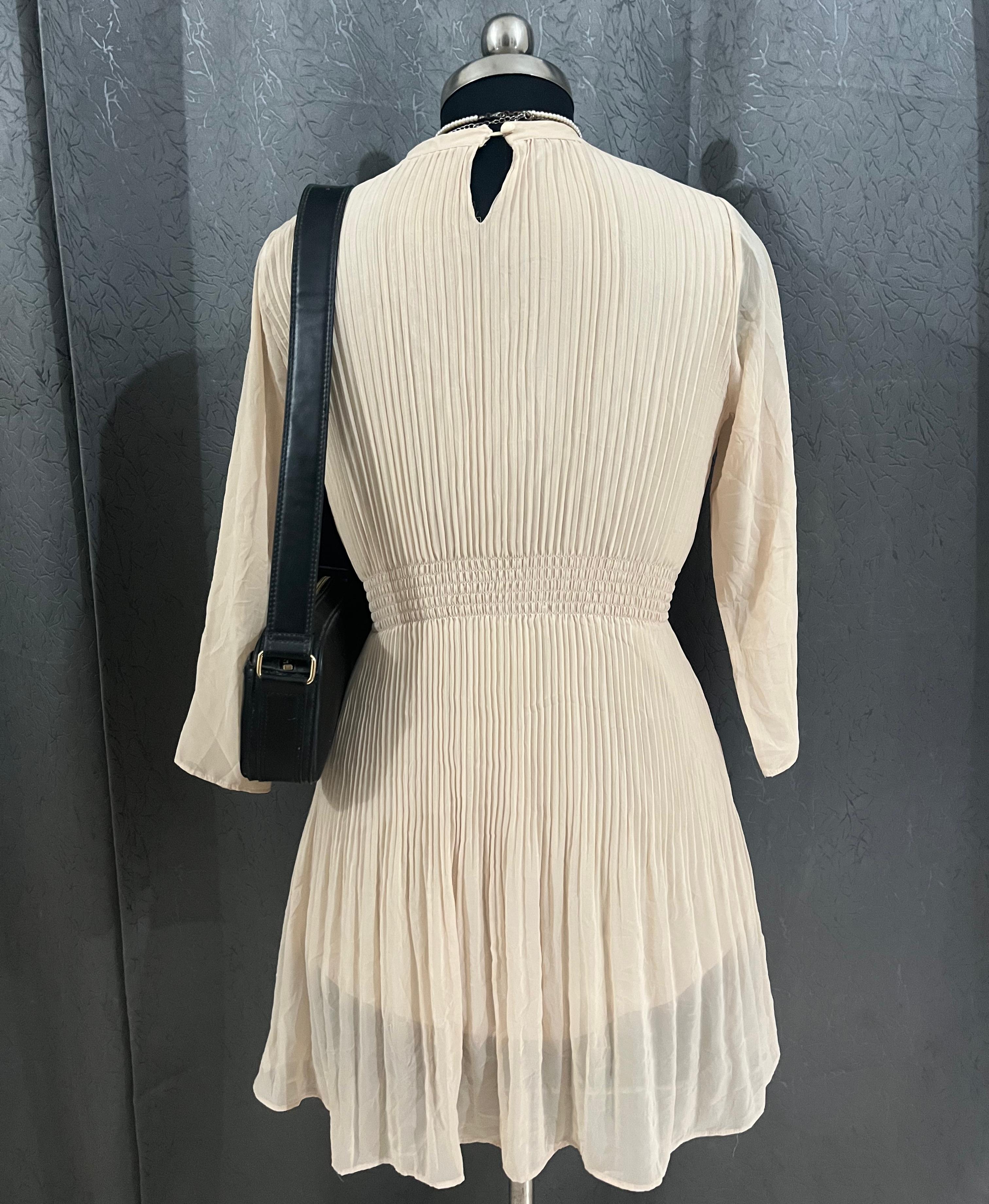 Beige Pleated Mini Dress – Chic & Elegant Style